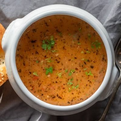 Traditional Bosnian tarhana soup served at Kašika Viljuška Nož in Sarajevo