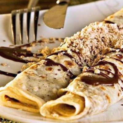 Warm satisfaction in chocolate pancakes served at Kašika Viljuška Nož in Sarajevo